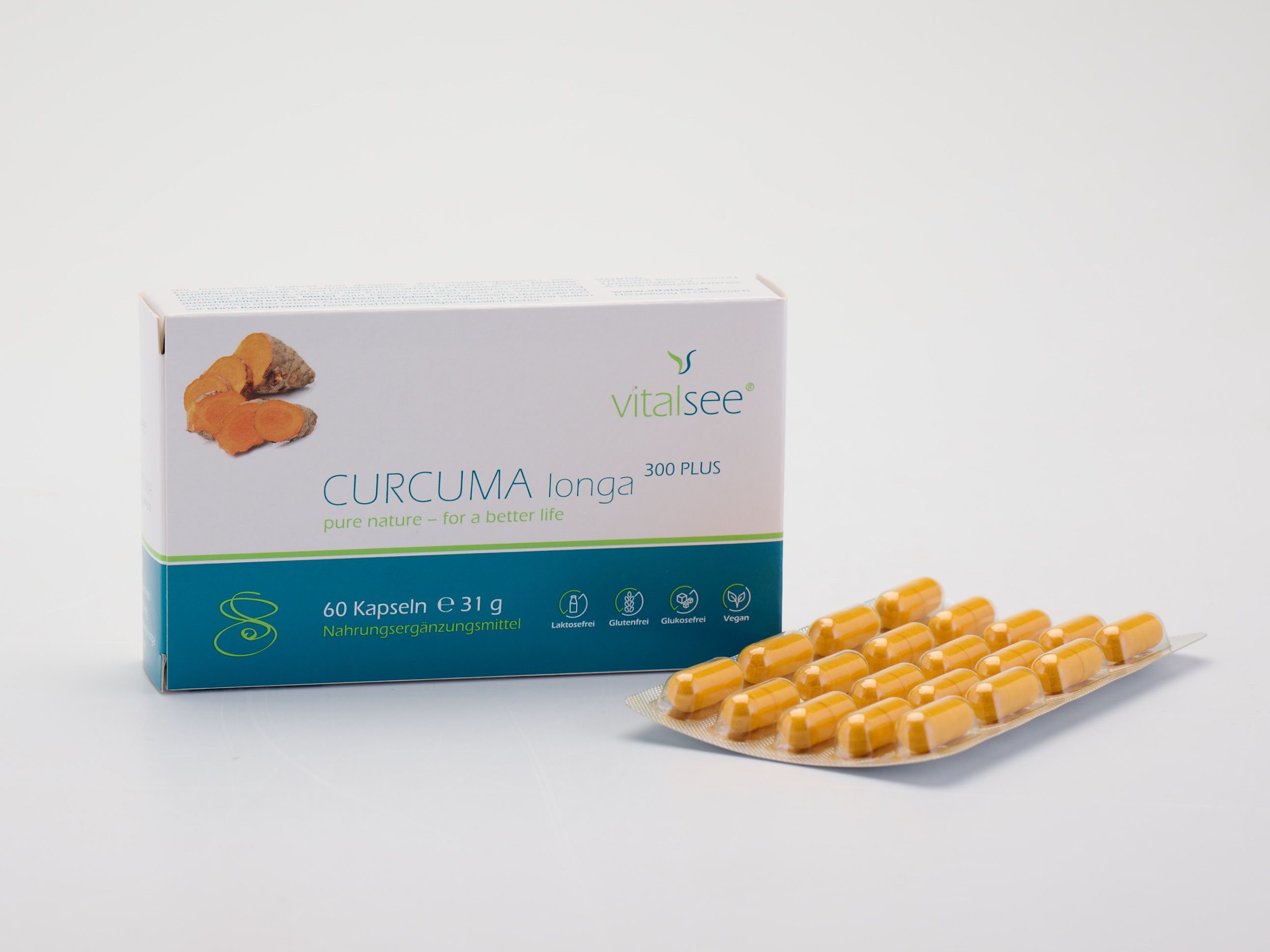 Vitalsee CURCUMA longa 300 PLUS-Packung mit 60 Kapseln und einer Blisterpackung mit Kapseln. Glutenfrei, laktosefrei, vegan.