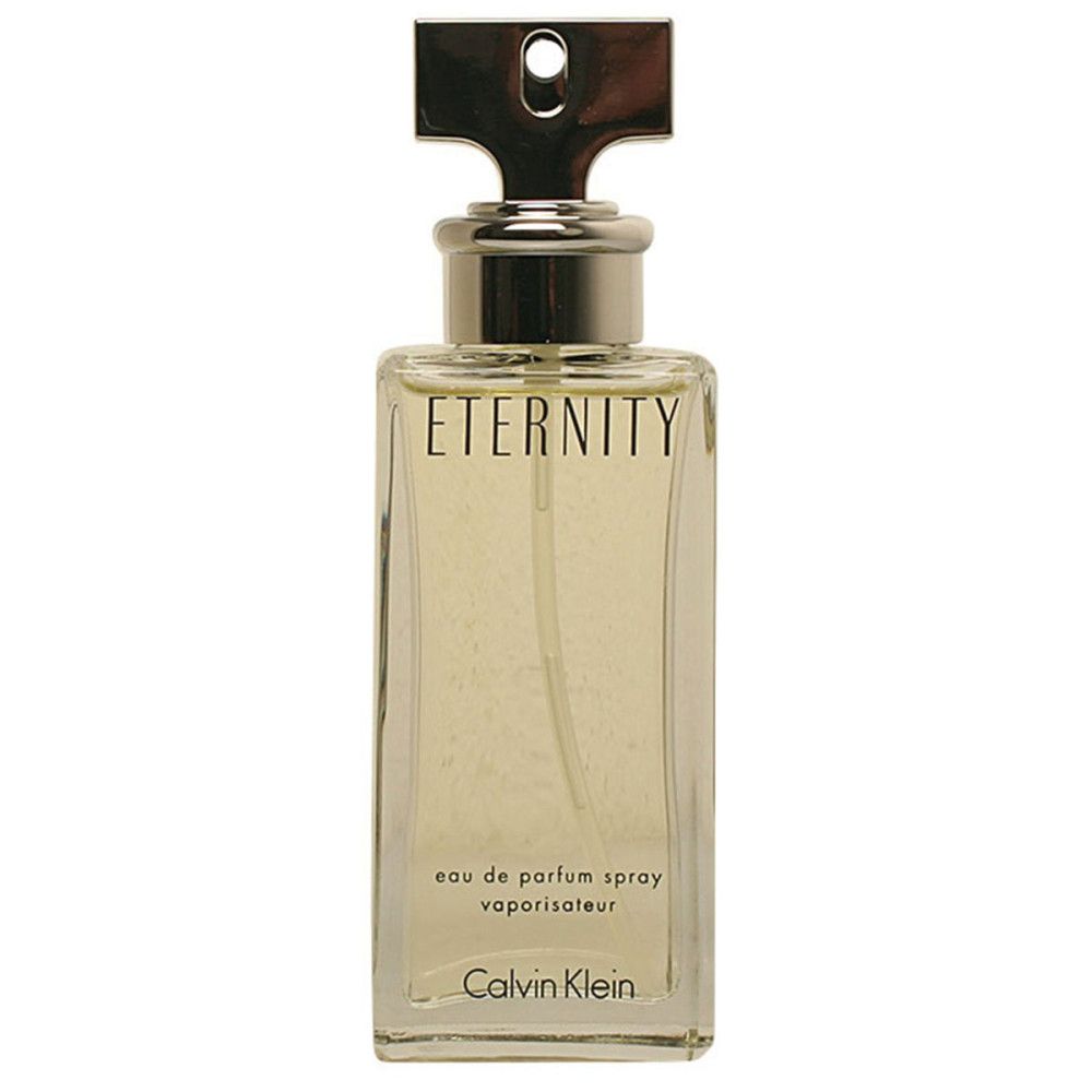 Rechteckige Parfumflasche mit silbernem Verschluss. Aufschrift: Eternity, Calvin Klein.