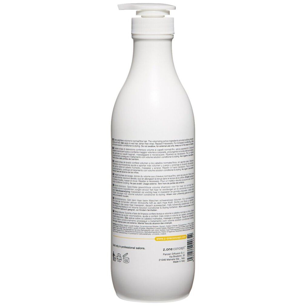 Rückseite einer weißen Shampoo-Flasche mit Text. Aufschrift: milk_shake. Informationen in mehreren Sprachen.