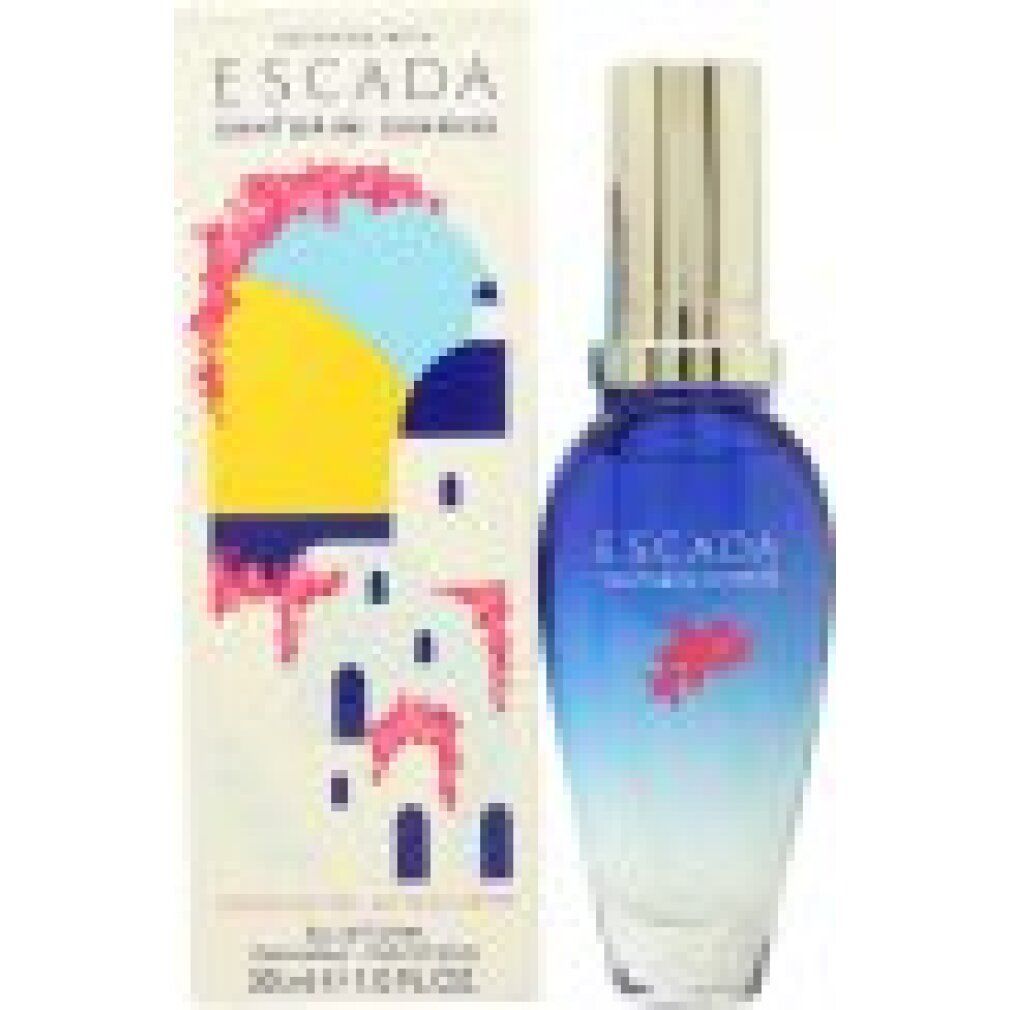 Blau-transparente Flasche mit silbernem Verschluss und Schachtel. Produktname und Illustration auf der Schachtel.