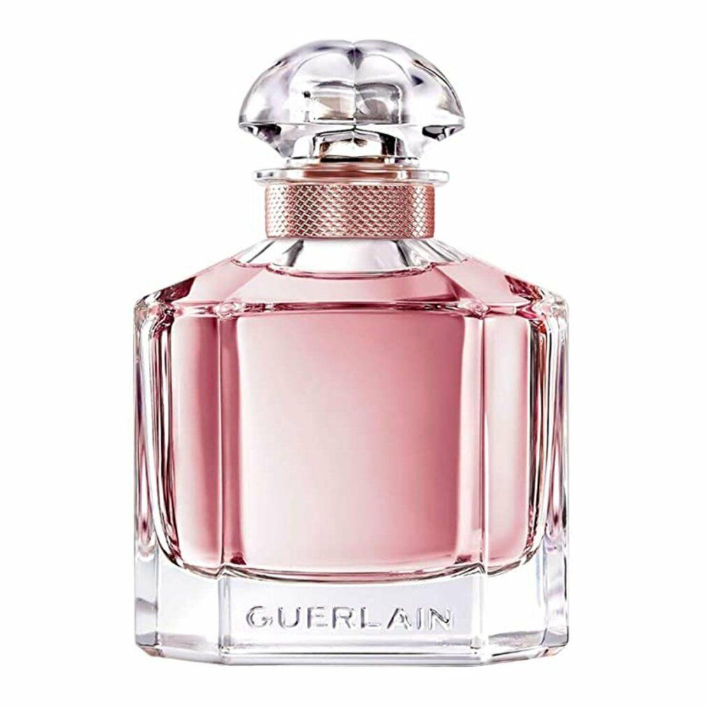 Parfümflakon. Quadratische Form, rosa Flüssigkeit, Glasdeckel. Text: Guerlain.