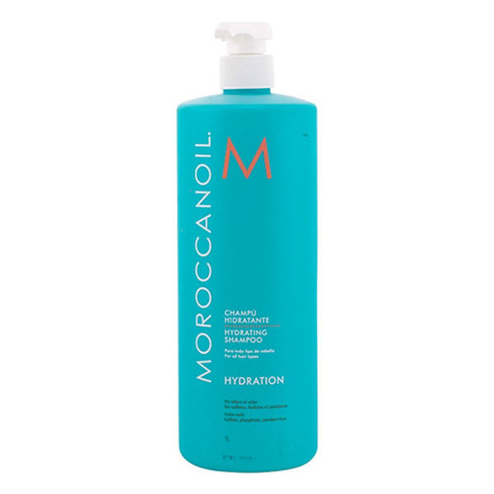 Türkisgrüne Flasche mit weißem Pumpkopf. Aufschrift: Moroccanoil, Champú Hidratante. Orangefarbenes Logo.