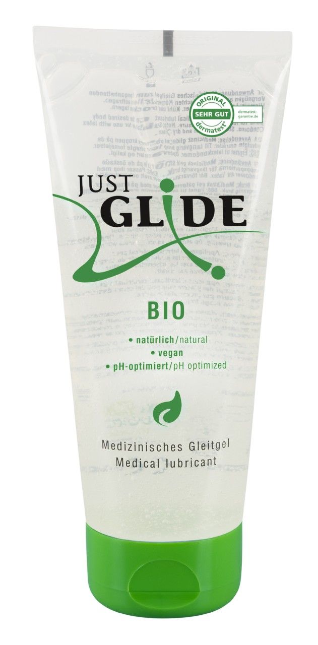 Tube mit transparentem Gel und grünem Verschluss. Aufschrift: Just Glide Bio, Medizin. Gleitgel. Siegel.