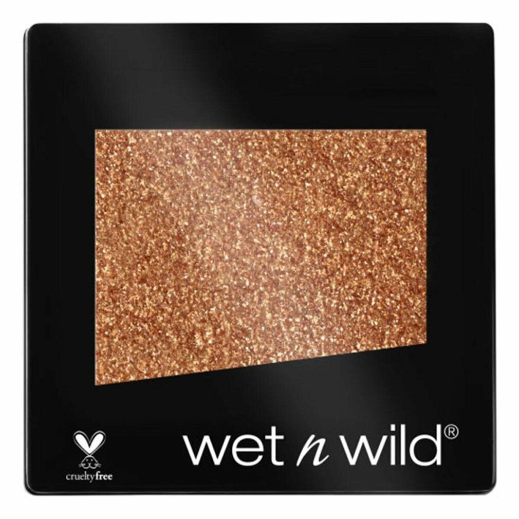 Quadratischer, schwarzer Behälter mit goldfarbenem Lidschatten. Unten steht "wet n wild" und ein Cruelty-Free-Logo.