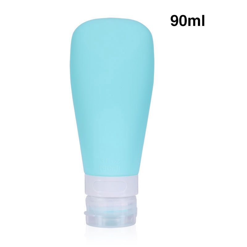 Eine einzelne türkisfarbene 90ml Silikon-Reiseflasche mit weißem und klarem Verschluss.