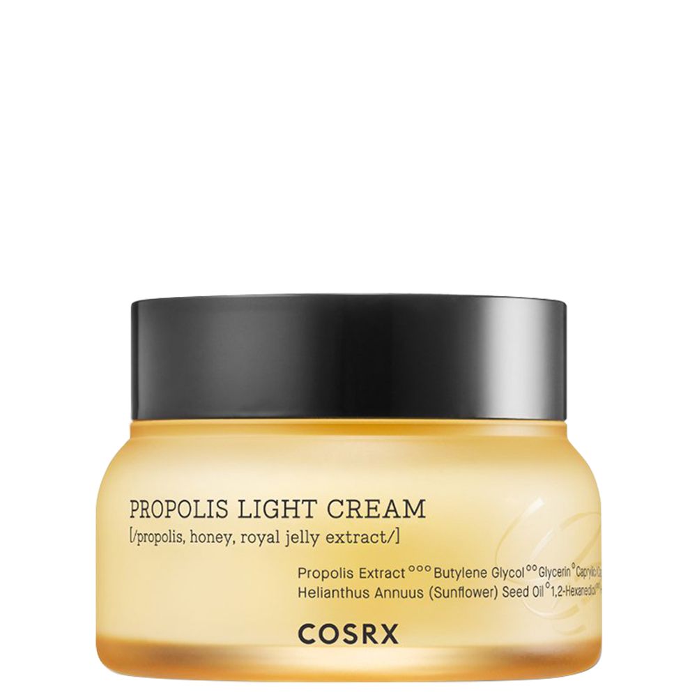 COSRX Propolis Light Cream in einem gelben Glasbehälter mit schwarzem Deckel.