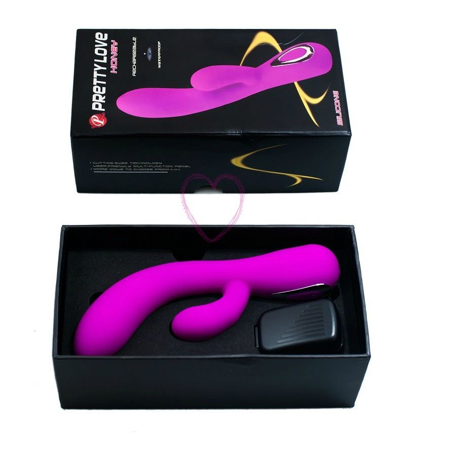 Verpackung mit lila Vibrator. Schwarzer Karton mit Produktname und Abbildung. Vibrator in schwarzer Schachtel.