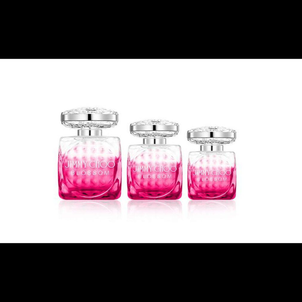 Drei rosa Flakons mit silbernen Deckeln. Aufschrift: Jimmy Choo Blossom.