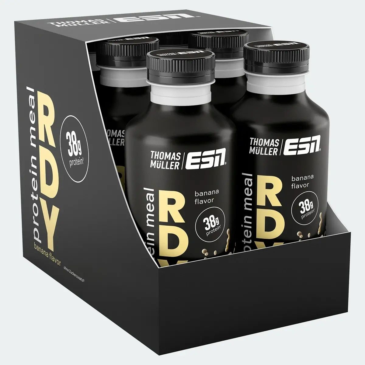 Schwarze Flaschen in einer schwarzen Verpackung. Auf jeder Flasche steht "ESN", "Thomas Müller" und "RDY Protein Meal". Aufschrift: "38g protein".