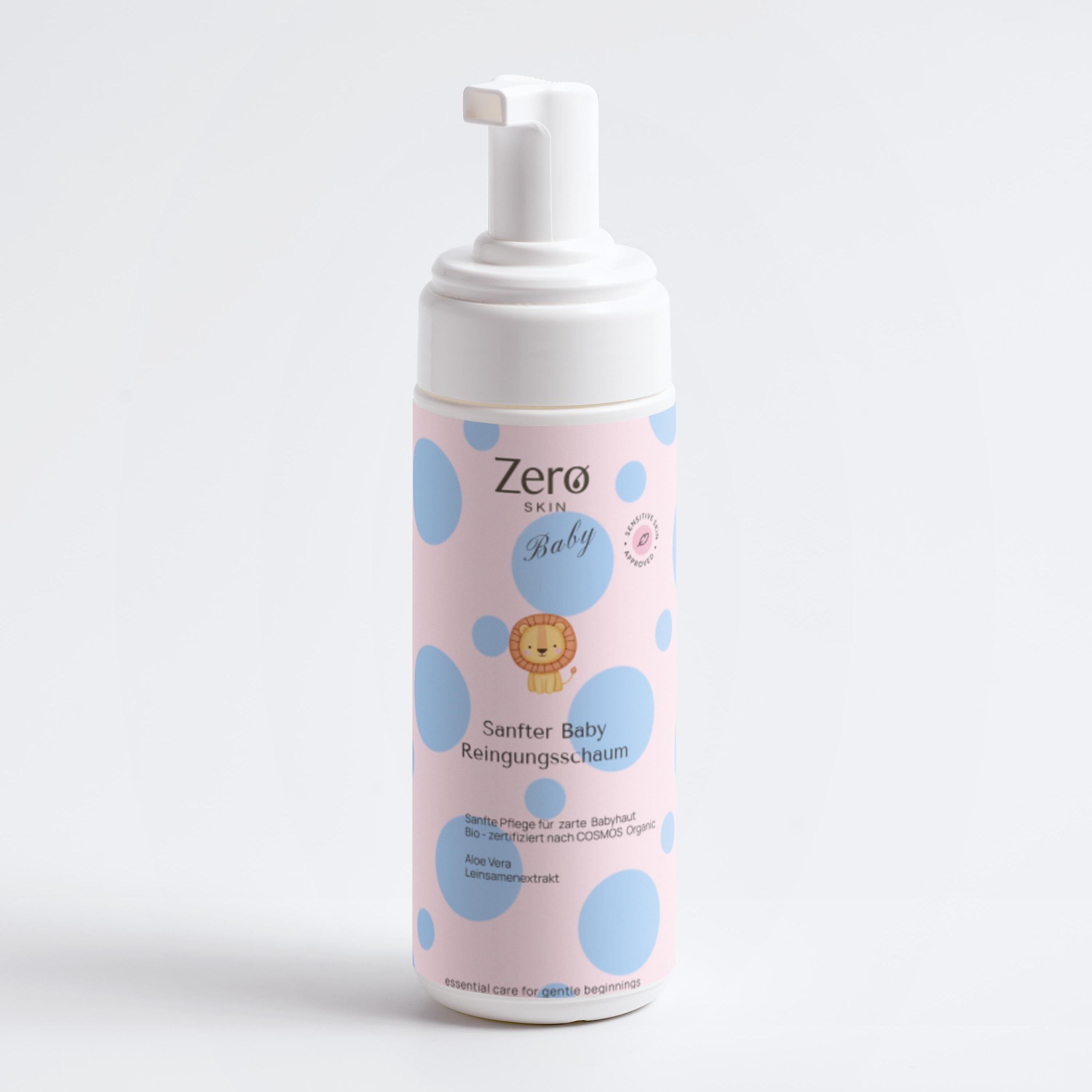 Zero Skin Baby Reinigungsschaum in einer rosa Flasche mit blauen Punkten und einem Löwenmotiv.