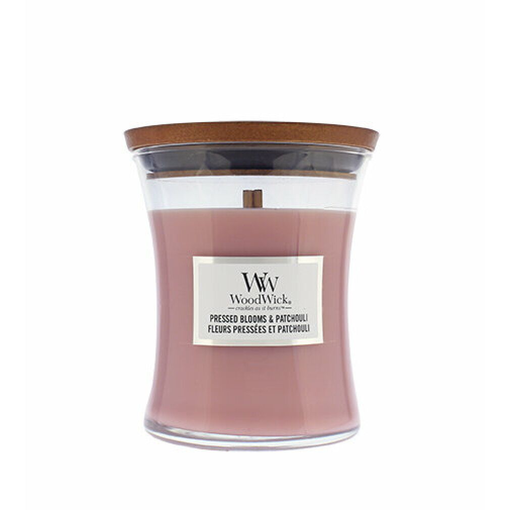 Kerze mit Holzdocht und Deckel. Rosa Wachs in Glasbehälter. Etikett mit Produktnamen und Logo.