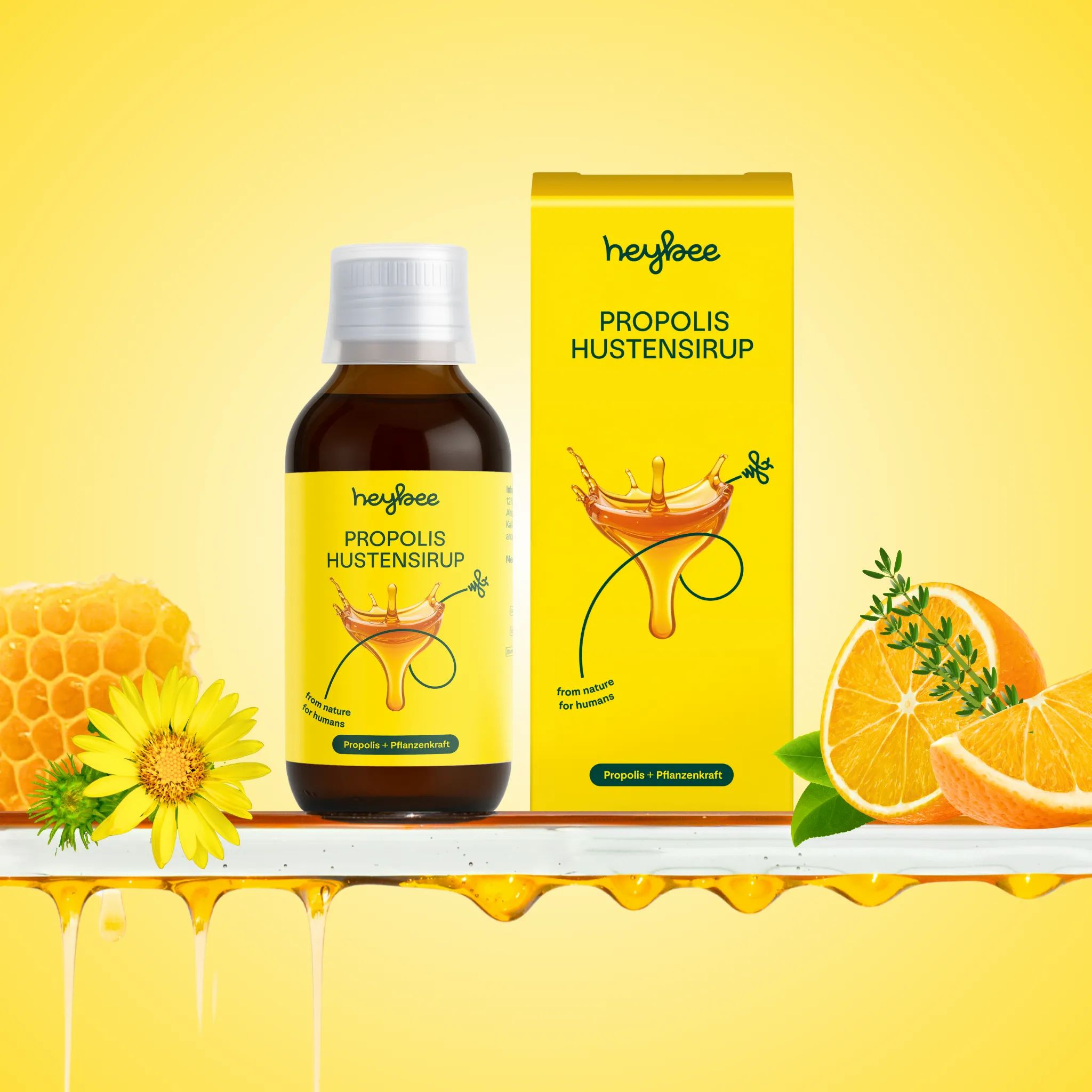 Flasche und Schachtel Heybee Propolis Hustensirup. Honig, Orange, Blüte. Gelber Hintergrund. Propolis Hustensirup für Husten.