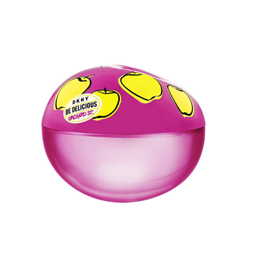 Runder, pinker Flakon mit gelben Äpfeln und DKNY Be Delicious Orchard St. Aufschrift.