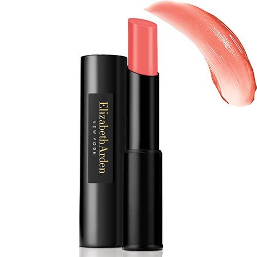 Lippenstift mit schwarzer Hülse und Pfirsichton. Daneben ein Farbabstrich. Auf der Hülse steht "Elizabeth Arden NEW YORK".
