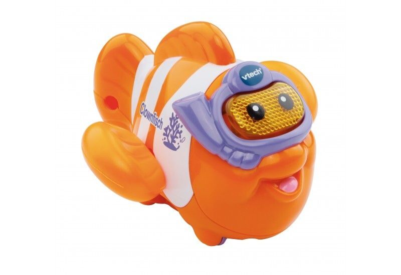 Orangefarbener Clownfisch mit weißem Bauchband und Taucherbrille. Auf dem Bauch steht "Clownfisch". Das Produkt hat das Logo von Vtech.