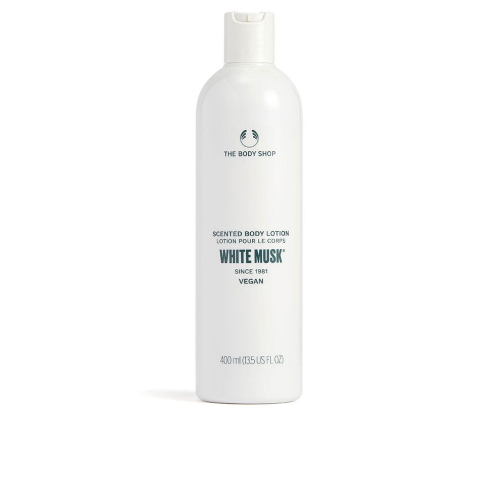 Weiße Flasche mit THE BODY SHOP-Logo und Text: Scented Body Lotion White Musk. Vegan. 400 ml.