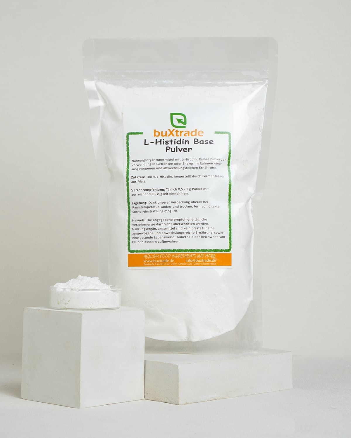 Verpackung von buXtrade L-Histidin Base Pulver, weißes Pulver in einem Standbodenbeutel mit Etikett.