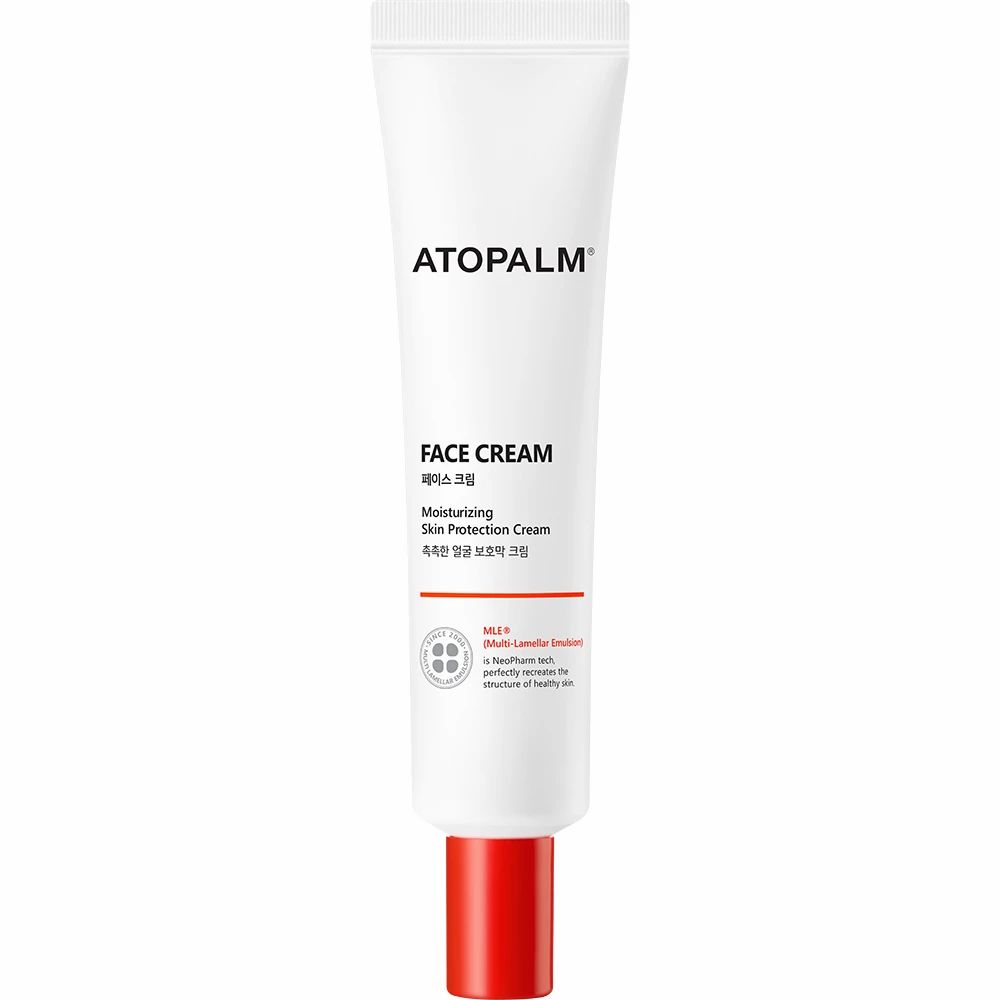 Weiße Tube mit rotem Verschluss. Aufschrift ATOPALM FACE CREAM. Produktinformationen.