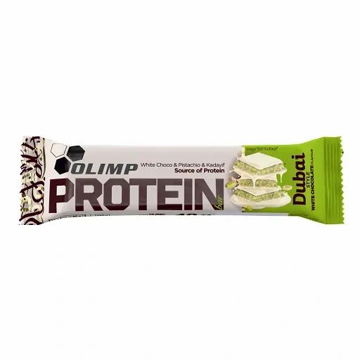 Proteinriegel in weißer Verpackung. Aufschrift: Olimp Protein Bar Dubai Style. Weißer Schoko-Pistazie-Geschmack.
