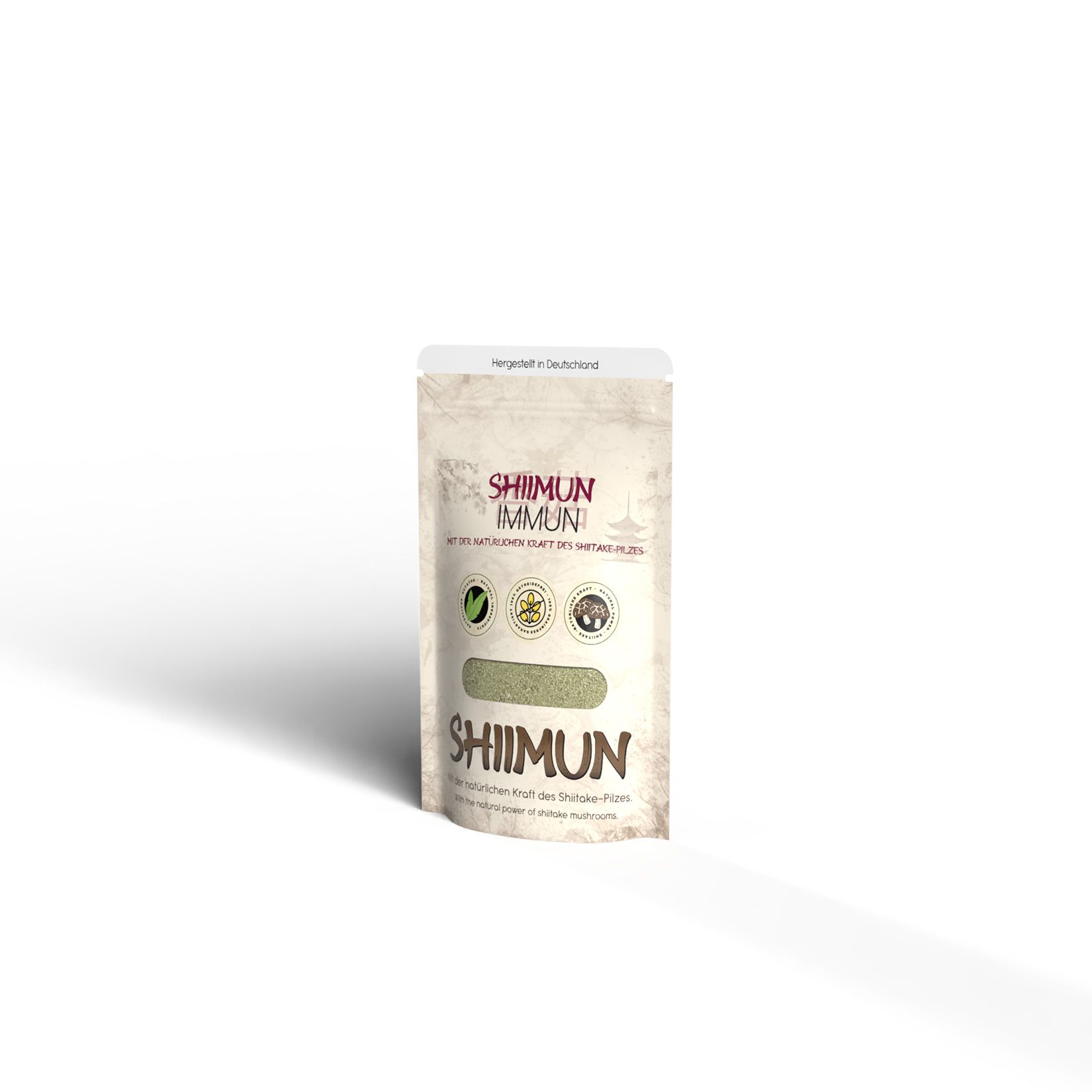 Beutel mit Shiimun Immun Pulver. Sichtbar: Logo, Produktname, grüne Pulverlinie, Siegel. Hergestellt in Deutschland.