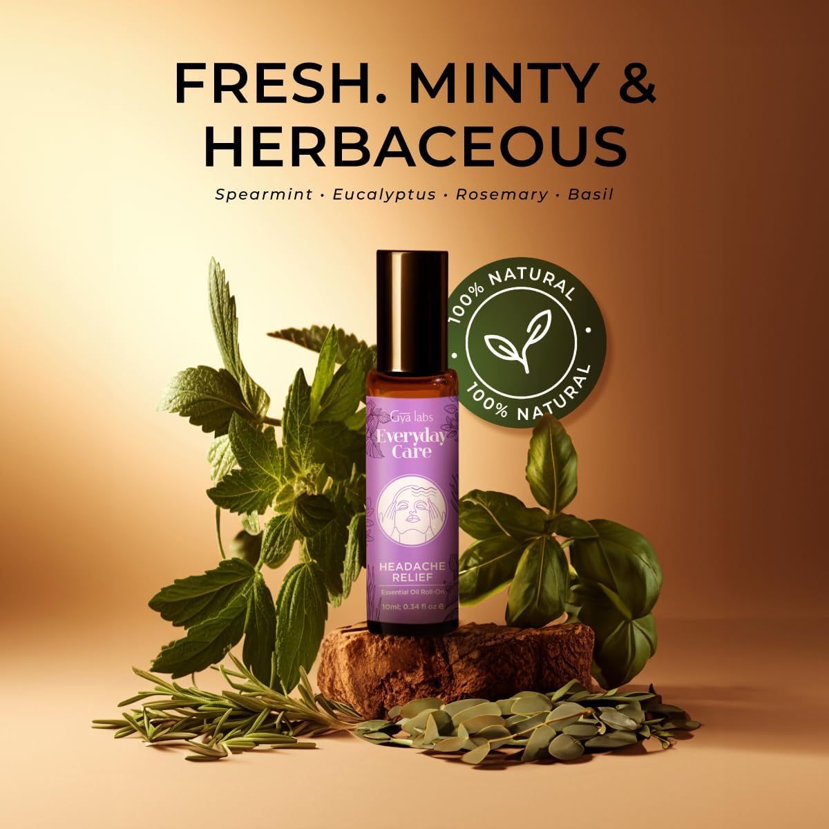 Roll-on-Flasche auf Holz. Text: Frisch, minzig & krautig. Inhaltsstoffe: Minze, Eukalyptus, Rosmarin, Basilikum. 100% natürlich. Everyday Care, Kopfschmerzlinderung.