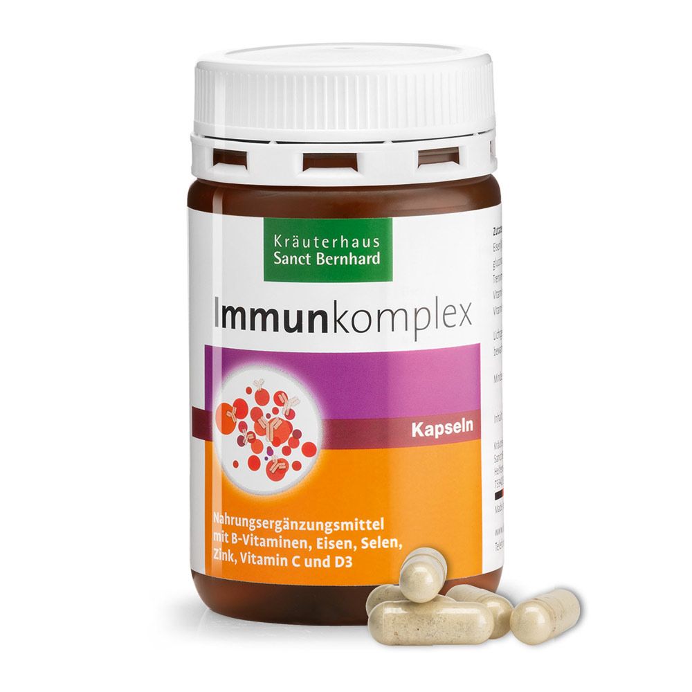 Braune Dose mit weißen Kapseln. Aufschrift: Immunkomplex-Kapseln. Enthält B-Vitamine, Eisen, Selen, Zink, Vitamin C und D3.