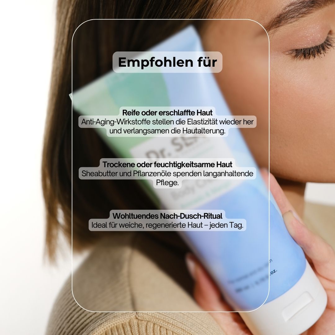 Frau hält Creme-Tube. Aufschrift: Dr. SEA, Anti-Aging Body Cream, Avocado & Mango. Empfohlen für reife oder erschlaffte Haut.