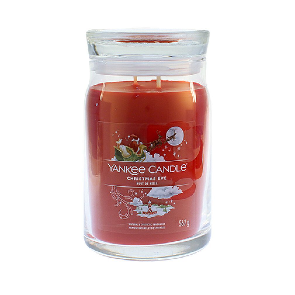Rote Kerze im Glasbehälter mit Deckel. Aufschrift: Yankee Candle Christmas Eve. 567g.