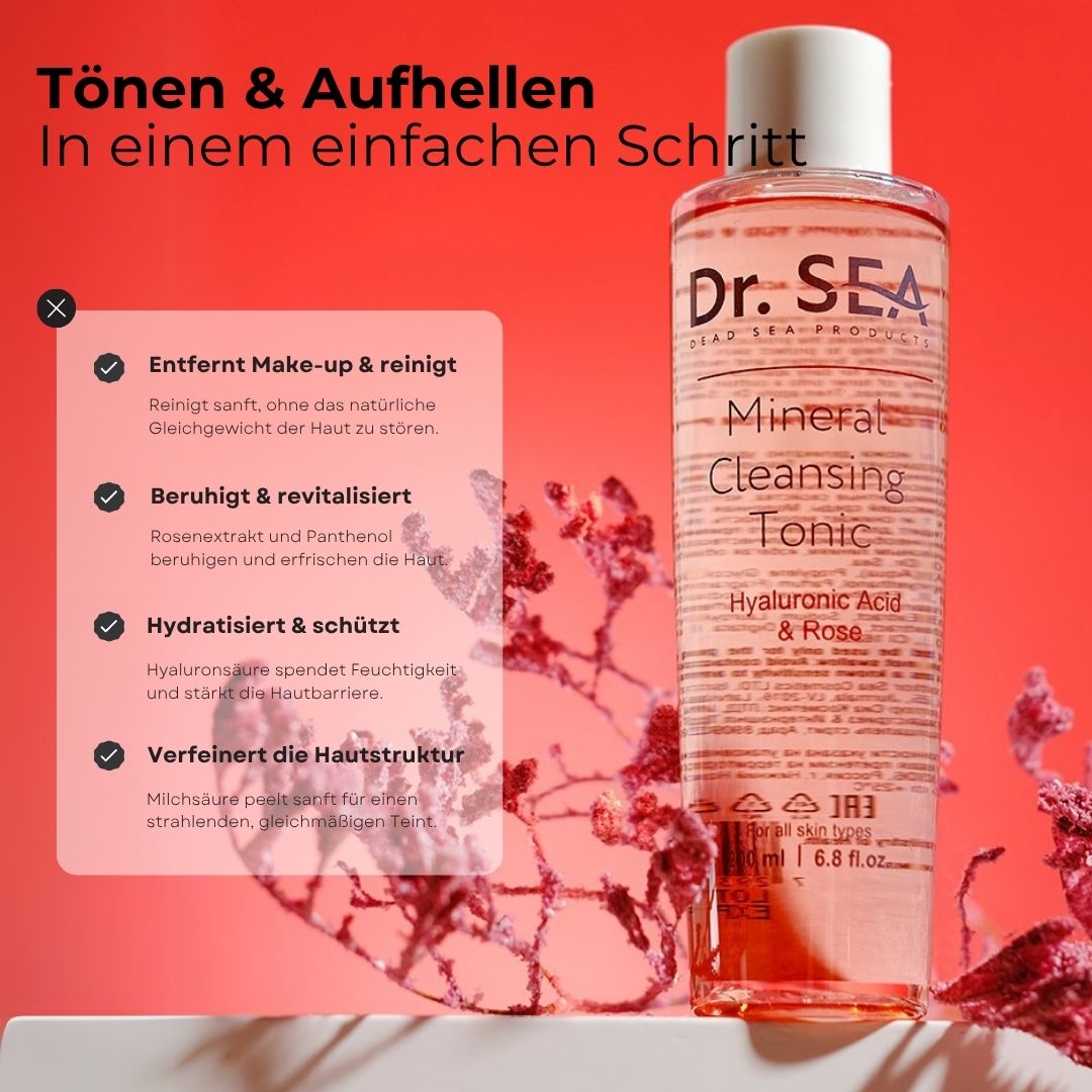 Rosa Tonic-Flasche mit Text. Aufschrift: Dr. Sea, Mineral Cleansing Tonic, Hyaluronsäure & Rose. 200 ml. Text über Vorteile.