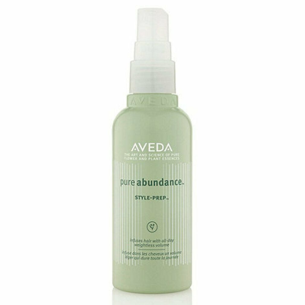 Grüne Flasche mit weißem Sprühkopf. Aufschrift: Aveda, pure abundance, Style-Prep. Text: Infuse hair with all-day weightless volume.