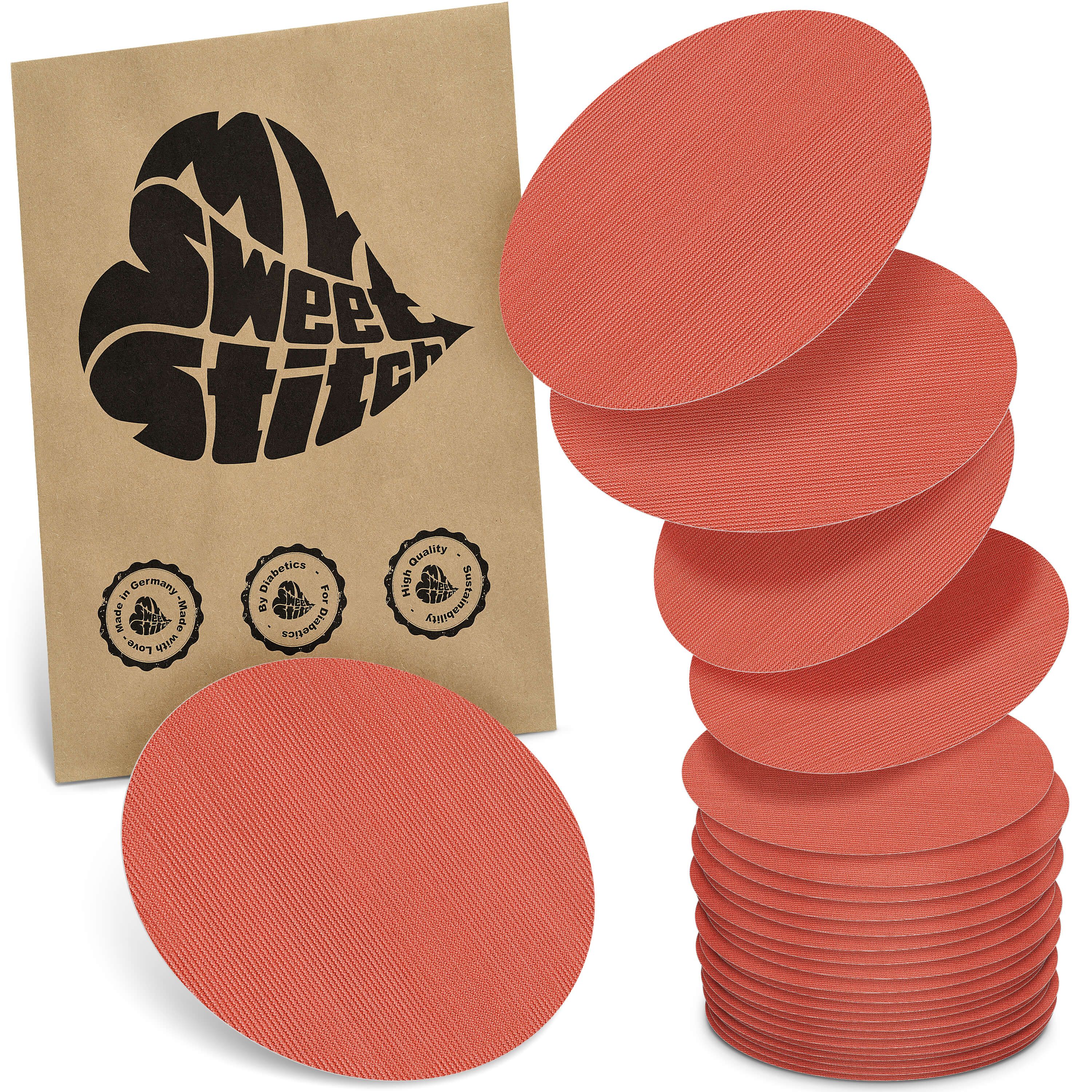 Runde, korallenfarbene Pads. Verpackung mit Logo und Qualitätssiegeln. Stapel von Pads und einzelne Pads.