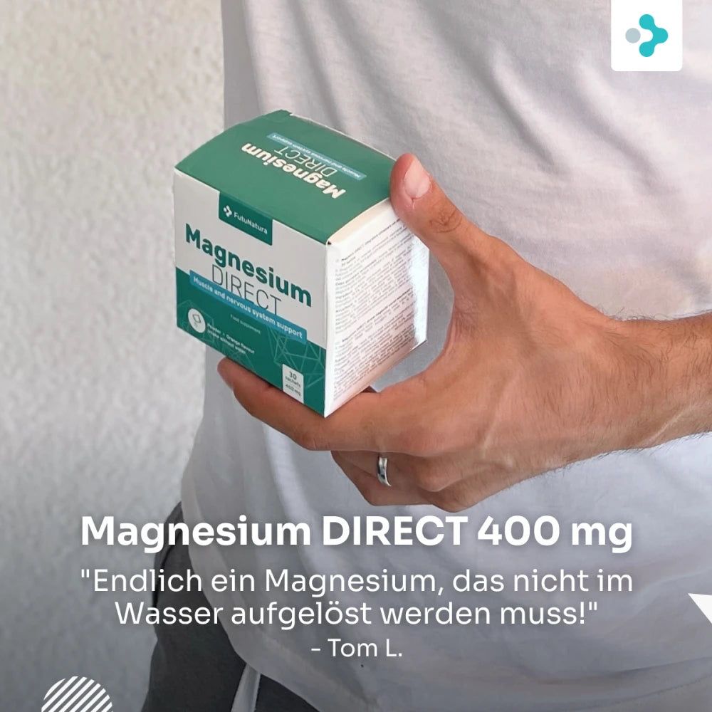 Person hält eine Schachtel Magnesium DIRECT. Aufschrift Magnesium DIRECT 400 mg.