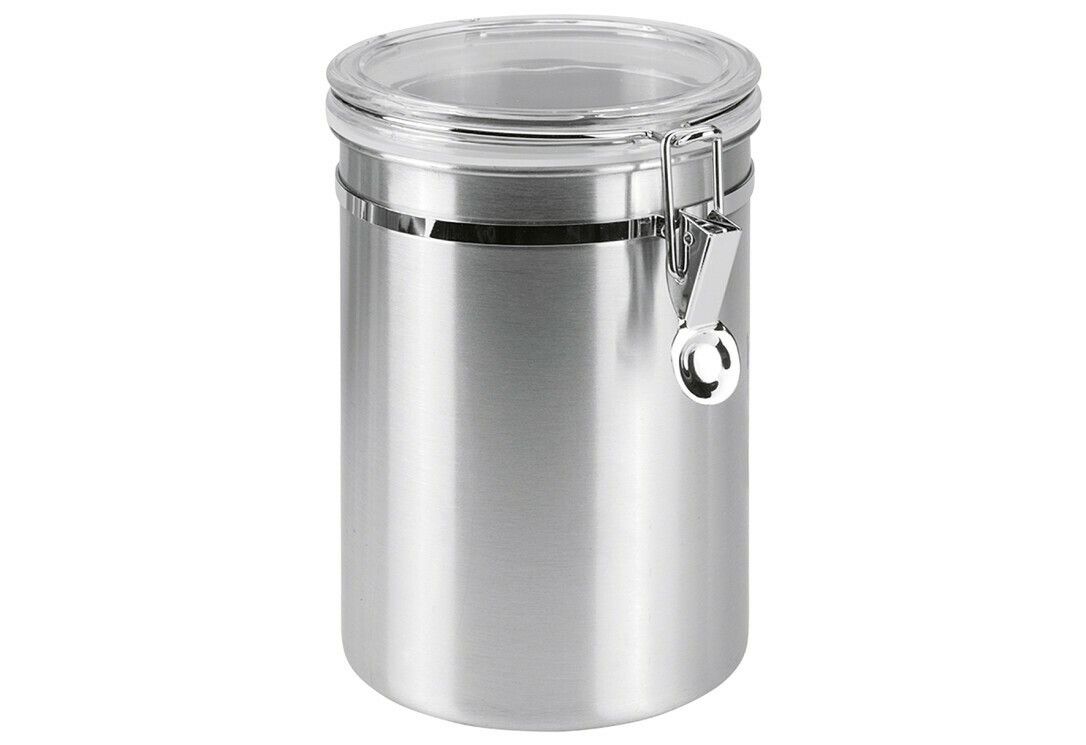 Zylindrischer Behälter aus Edelstahl mit transparentem Deckel und Verschluss. Der Behälter hat einen Metallverschluss.