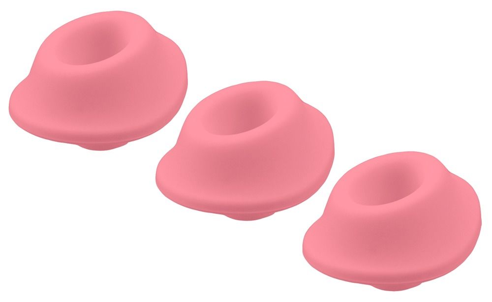 Drei rosa Ersatzkappen aus Silikon für Womanizer.
