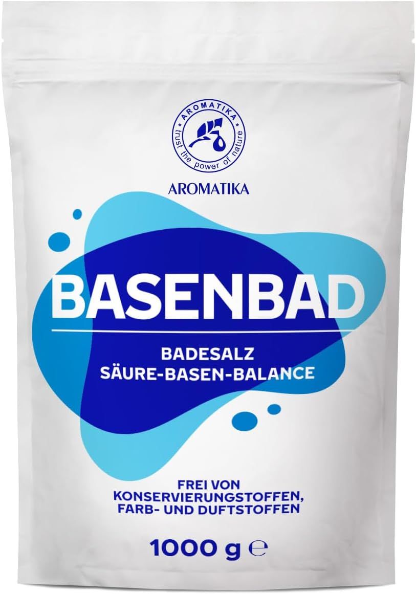 Weiße Verpackung mit blauem Design. Aufschrift: BASENBAD, Badesalz, Säure-Basen-Balance. Logo: AROMATIKA. Text: Frei von Konservierungsstoffen, Farb- und Duftstoffen. 1000 g.