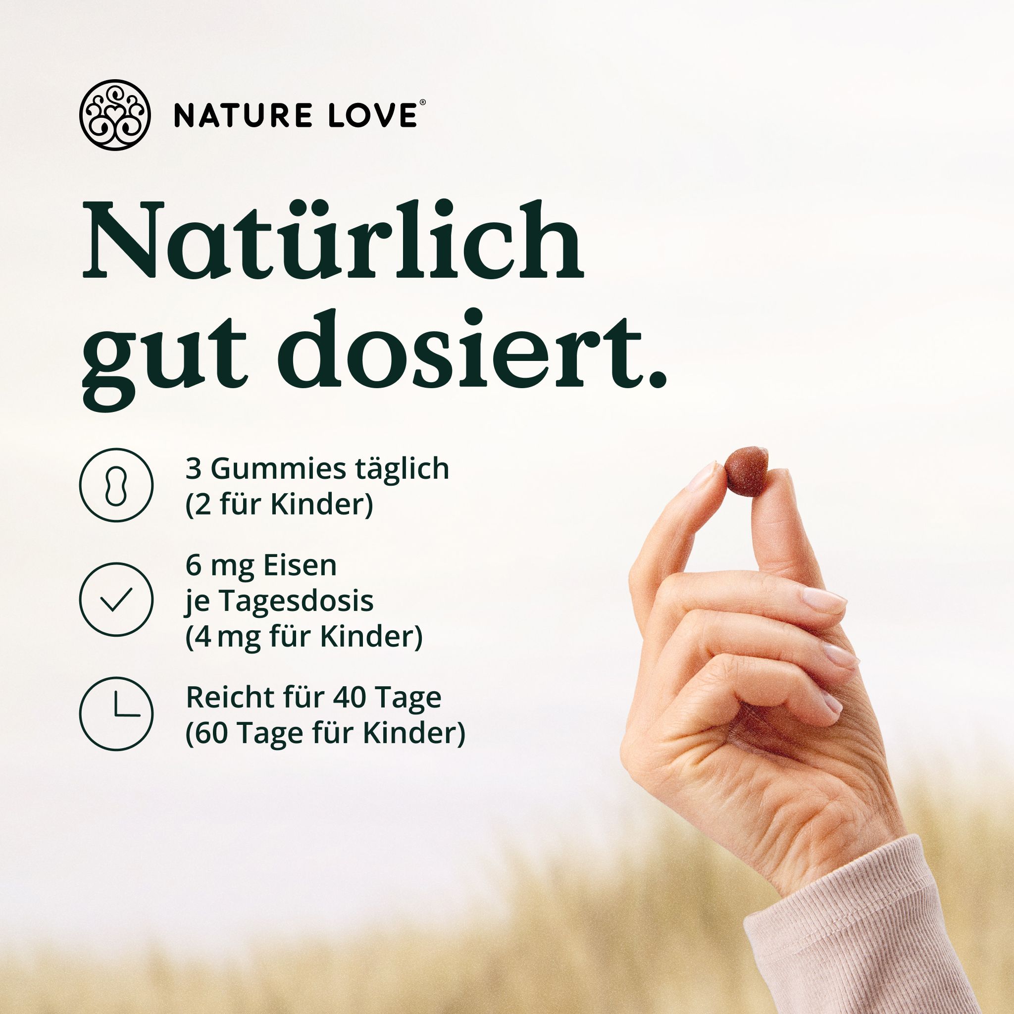 Hand hält eine Gummibärchen. Text: "3 Gummies täglich", "6 mg Eisen", "Reicht für 40 Tage". Logo NATURE LOVE®.