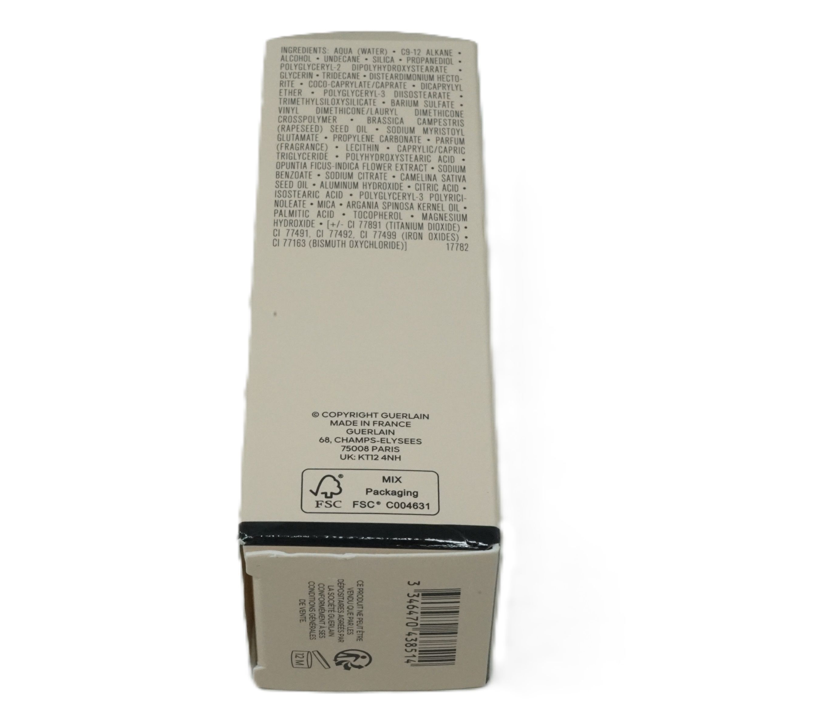 Beige Kartonverpackung. Text mit Inhaltsstoffen, Copyright, FSC-Logo und Barcode. Guerlain-Logo und Adresse.