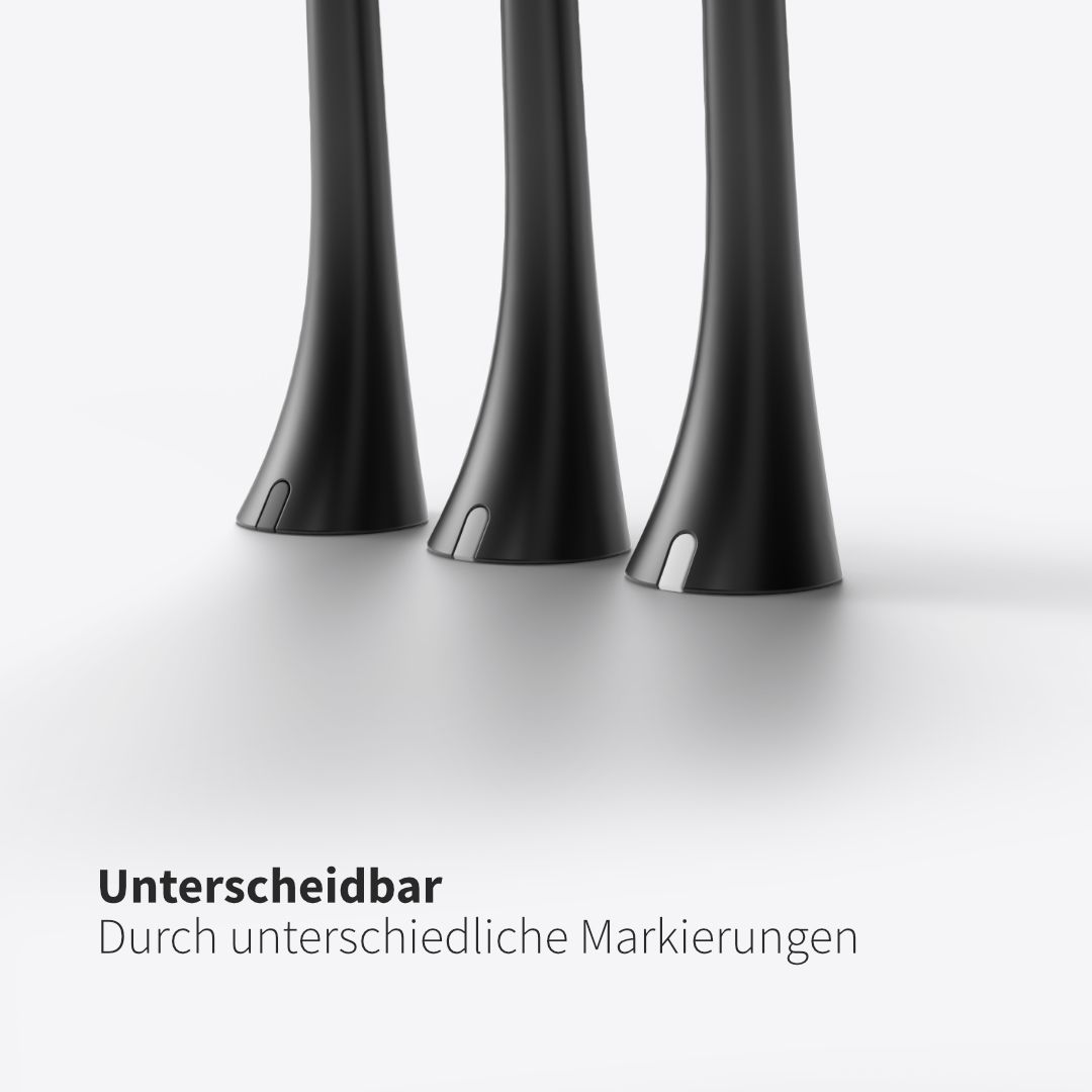 Drei schwarze Bürstenköpfe. Text: Unterscheidbar. Durch unterschiedliche Markierungen.