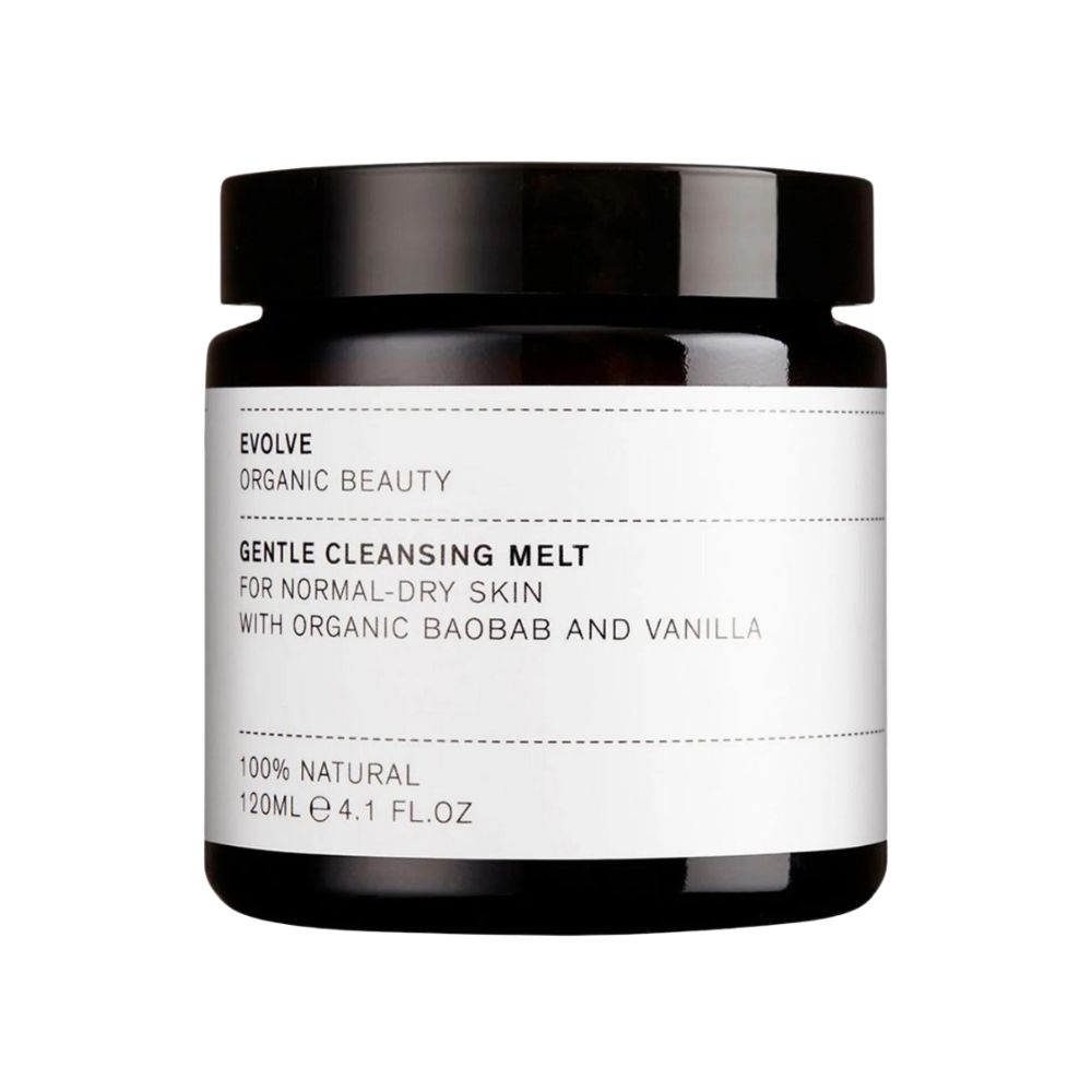 Schwarzes Glas mit Deckel. Auf weißem Etikett: "EVOLVE ORGANIC BEAUTY GENTLE CLEANSING MELT". Für normale bis trockene Haut. 120ml.