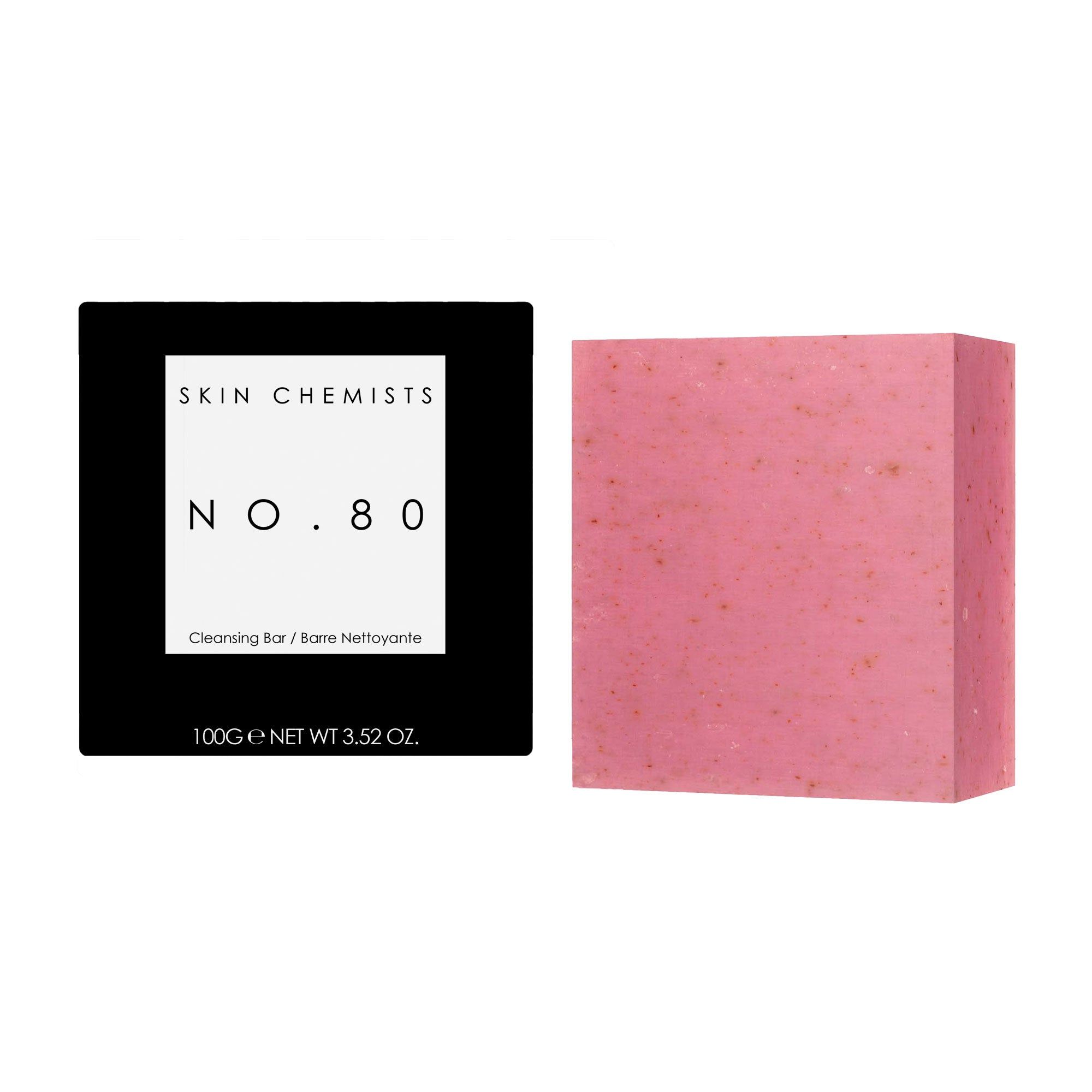 Rosa Seifenstück neben einer schwarzen Schachtel. Auf der Schachtel steht "SKIN CHEMISTS NO. 80".