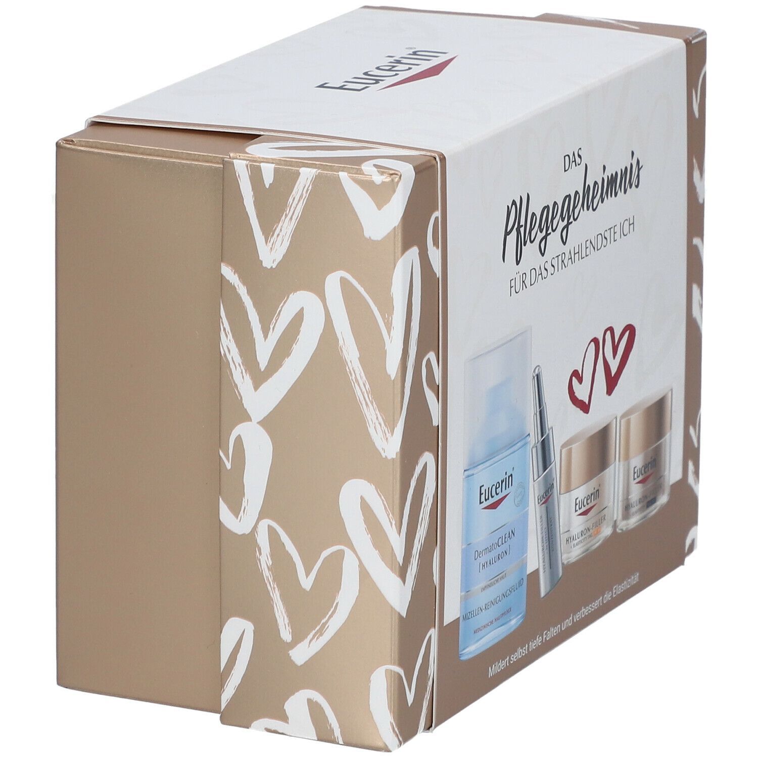 Geschenkbox mit Produkten. Aufschrift: Eucerin. Enthält Flasche, Serum und Cremes. Box mit Herzmuster und goldener Seite.
