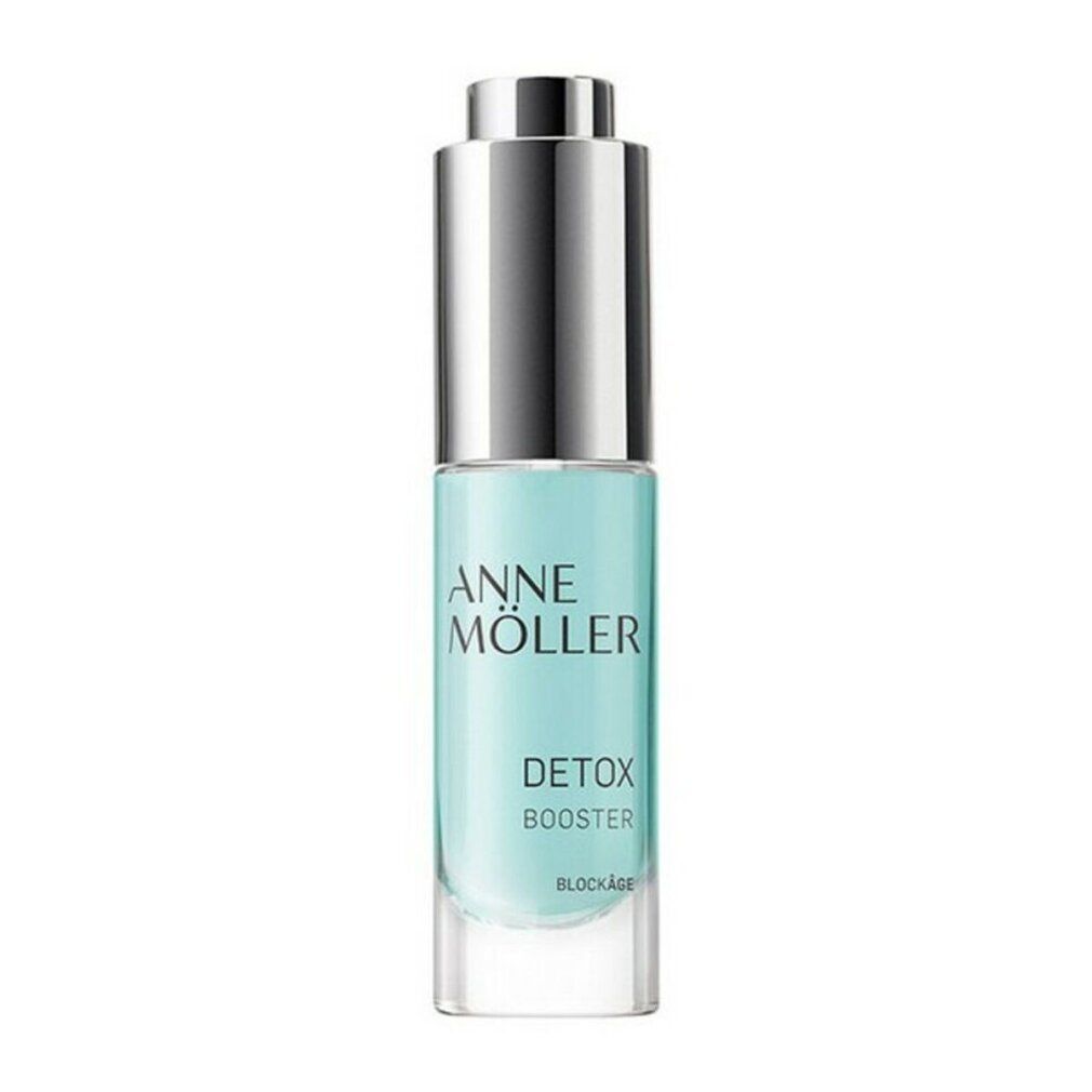 Flakon mit silbernem Verschluss. Aufschrift: Anne Möller Detox Booster. Transparente Flüssigkeit.