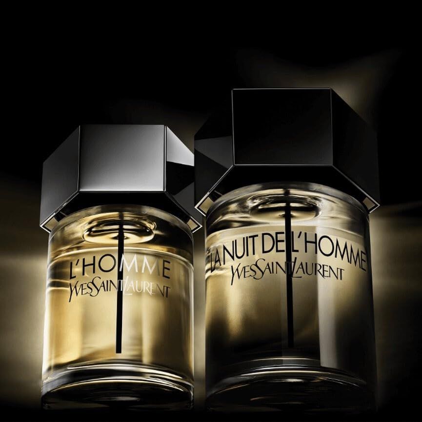 Zwei Flakons Yves Saint Laurent L'Homme und La Nuit de L'Homme.