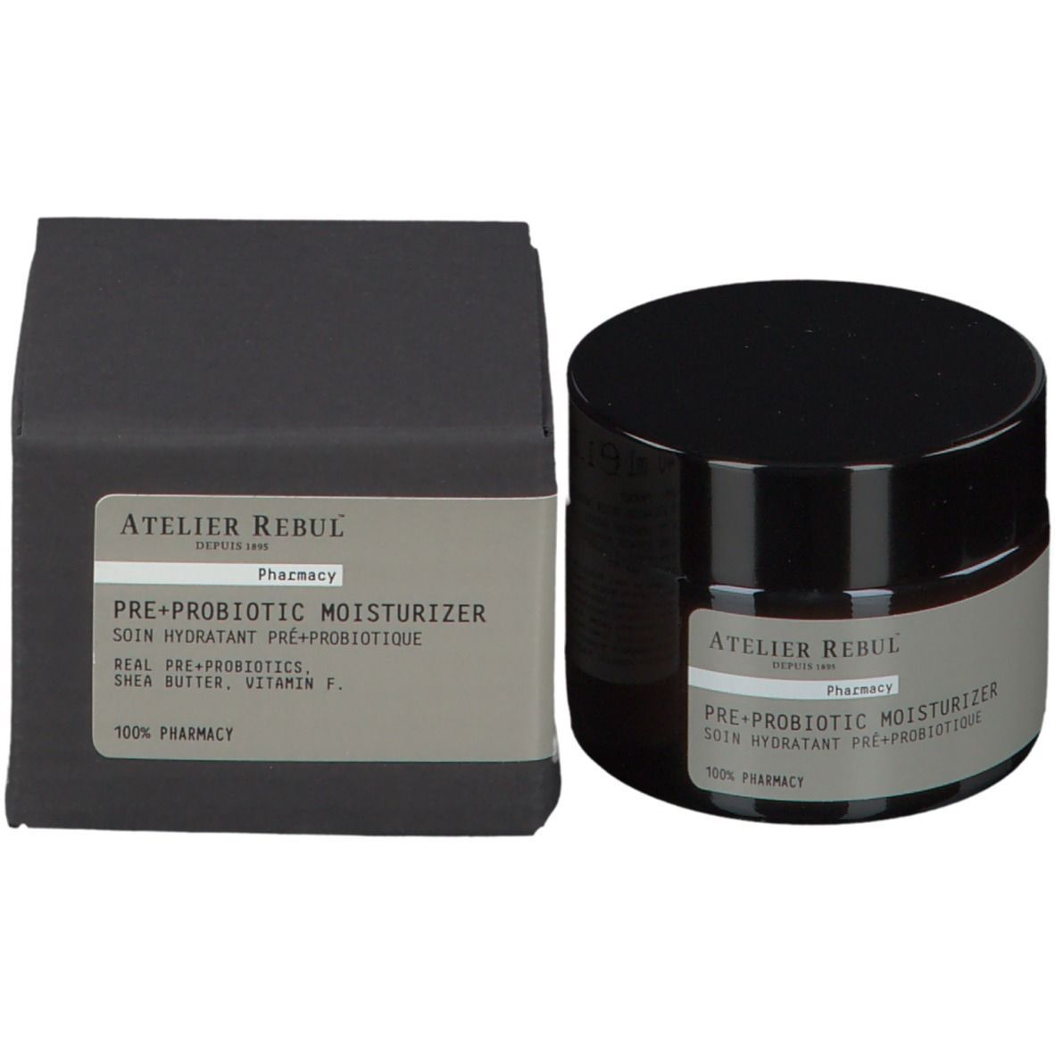 Creme-Dose und Schachtel. Auf der Dose steht: ATELIER REBUL PRE+ PROBIOTIC MOISTURIZER. Auf der Schachtel steht: ATELIER REBUL.