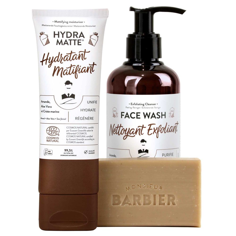 Gesichtsreiniger, Feuchtigkeitspflege und Seife von Monsieur BARBIER. Produkte mit braunen und weißen Etiketten, Seife mit Logo.