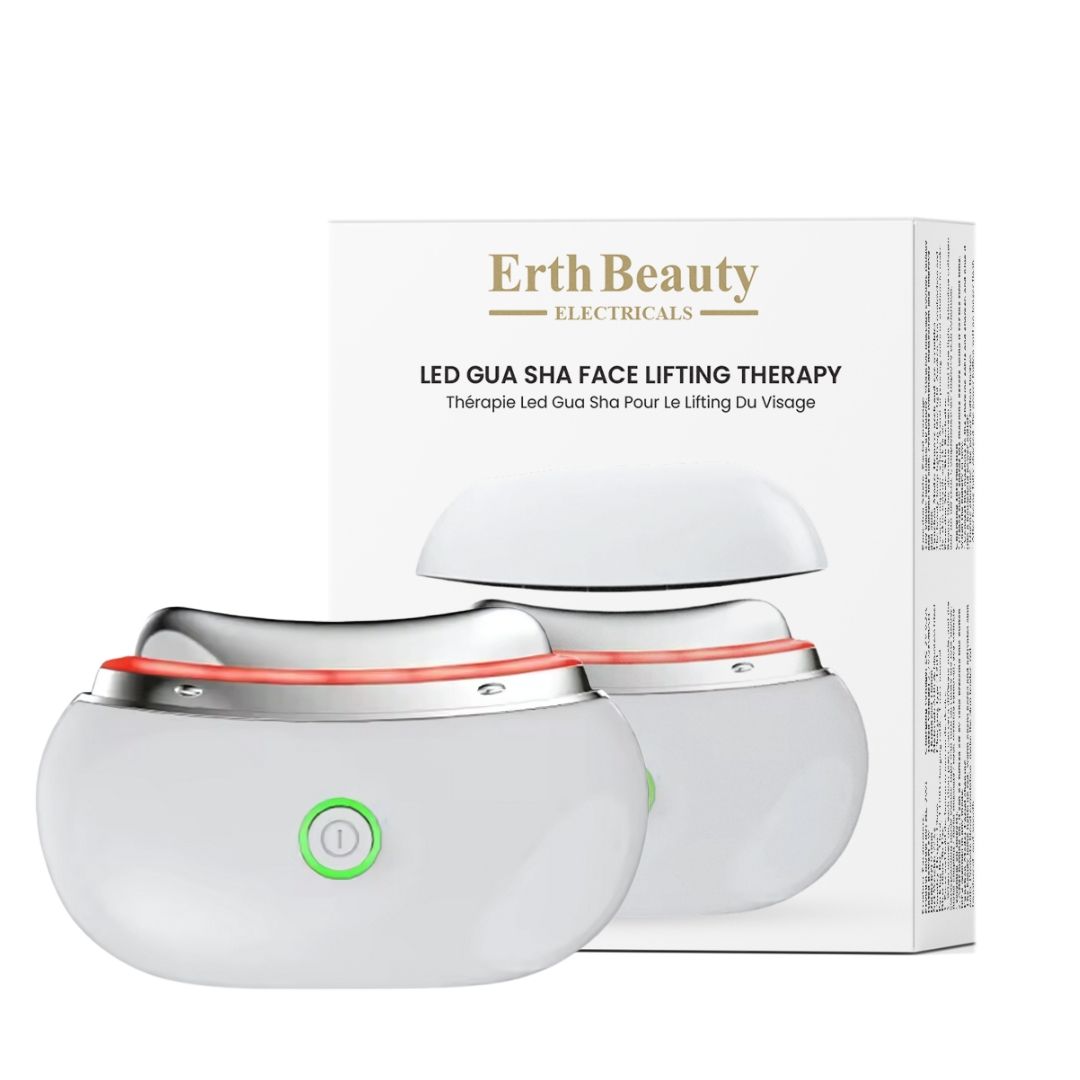 Weißes LED Gua Sha Lifting-Gerät mit silbernem Rand und grünem Power-Knopf. Verpackung im Hintergrund.