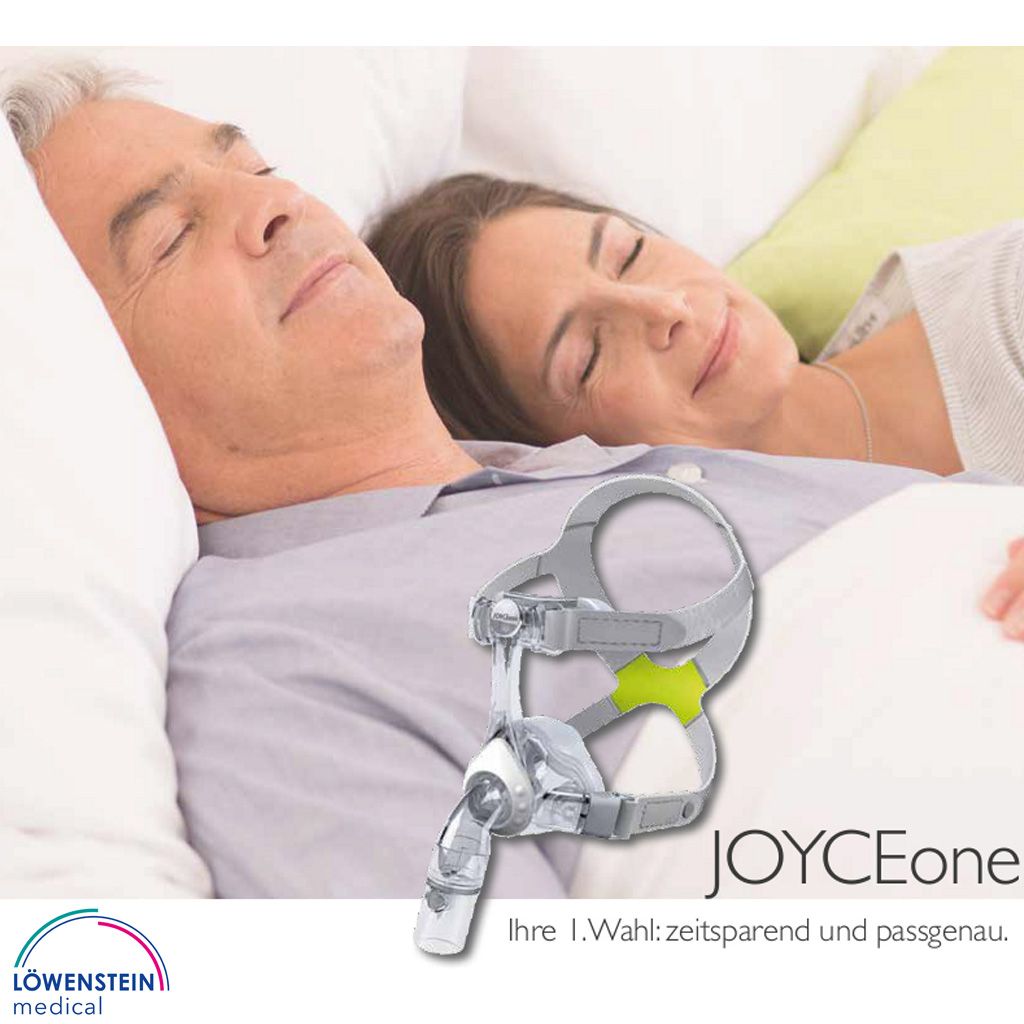 Graue und transparente CPAP-Maske mit Kopfteil und gelbem Akzent. "JOYCEone" Schriftzug.
