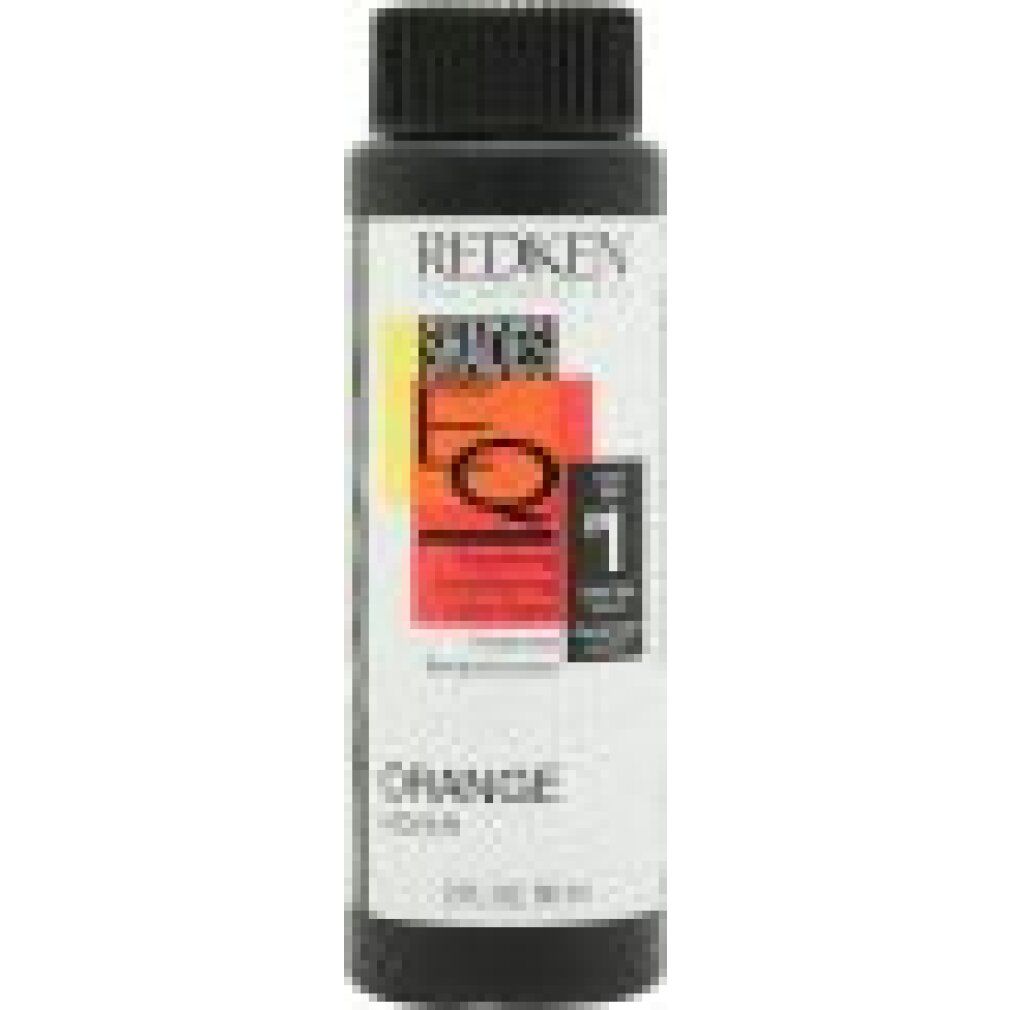 Flasche mit schwarzem Deckel. Aufschrift: REDKEN, SHADES EQ, ORANGE COLOR KICKER. Farbige Etikettierung.