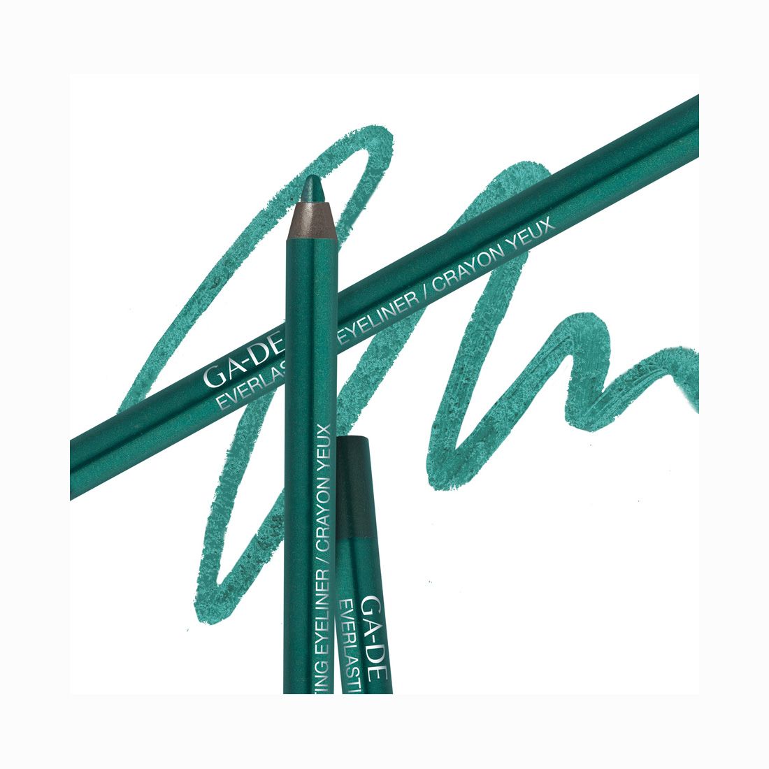 Zwei grüne Kajalstifte und ein Strich. Aufschrift: GA-DE Everlasting Eyeliner / Crayon Yeux.