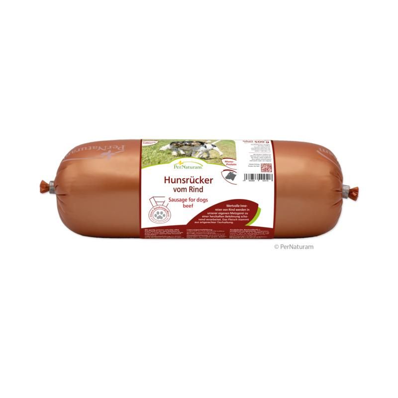 Wurst für Hunde. Braune, zylindrische Verpackung mit Etikett. Aufschrift: Hunsrücker vom Rind, Sausage for dogs beef.